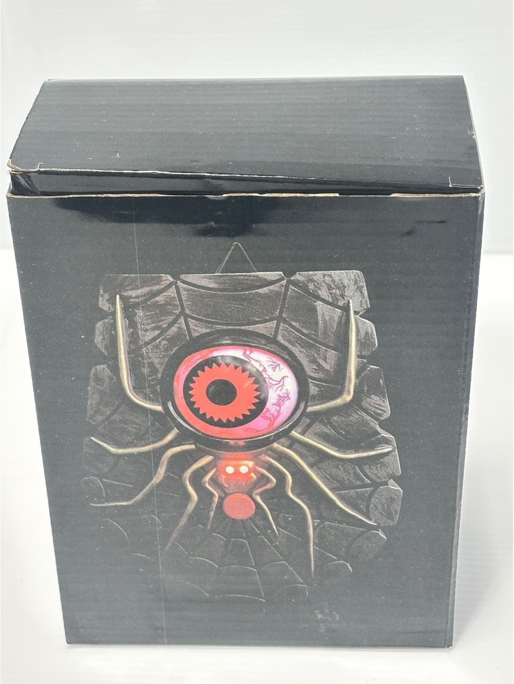 Vintage Spider Themed Decorative Figurine with Red Eye and Black Base